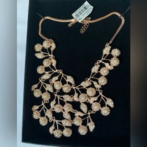 Inc. bib necklace in a rose gold hue never worn